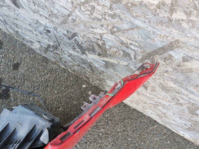 197668 Opel Astra H 2004-2007 első lökhárító, a képen látható sérüléssel