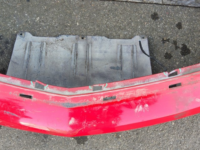 197668 Opel Astra H 2004-2007 első lökhárító, a képen látható sérüléssel