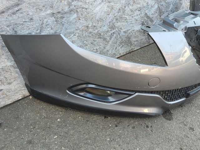 197670 Lancia Delta 2008-2014 első lökhárító, a képen látható sérüléssel 