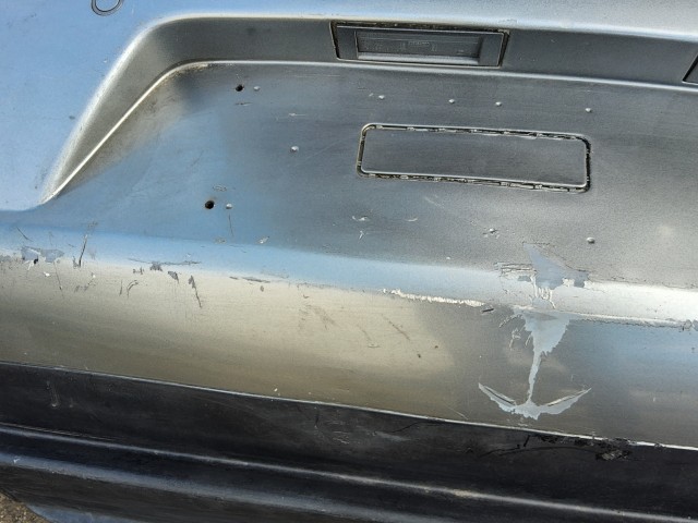 198197 Lökhárító Használt  hátsó Ezüst   a képen látható sérüléssel