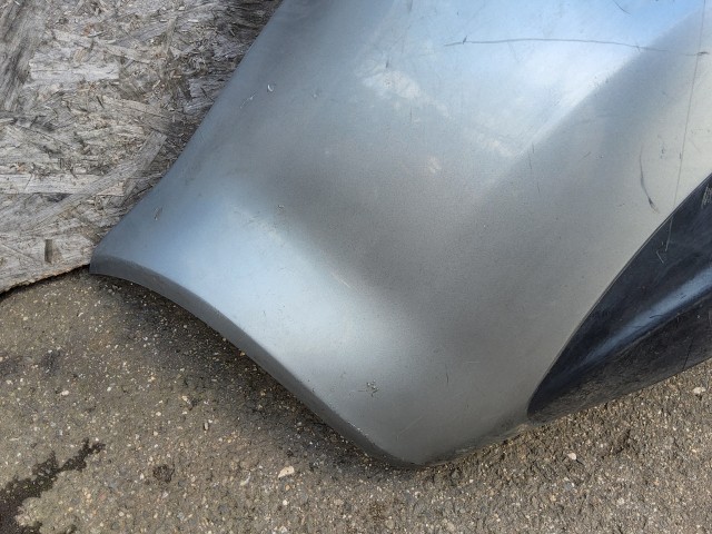 198197 Lökhárító Használt  hátsó Ezüst   a képen látható sérüléssel