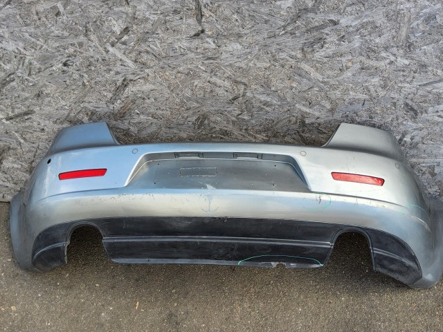 198197 Lökhárító Használt  hátsó Ezüst   a képen látható sérüléssel