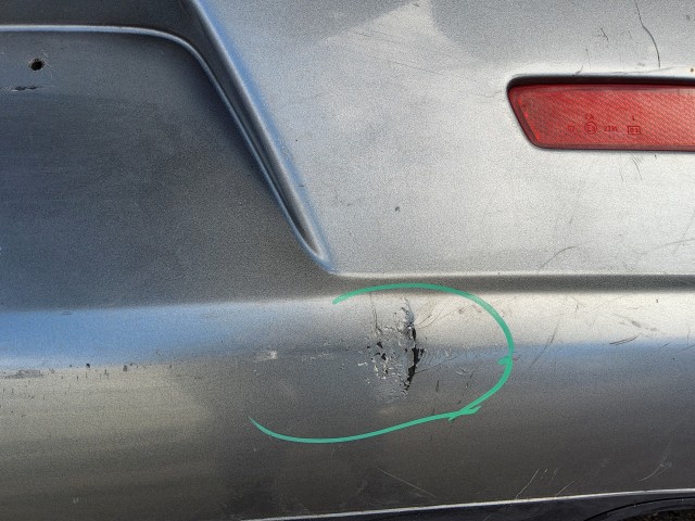 198197 Lökhárító Használt  hátsó Ezüst   a képen látható sérüléssel