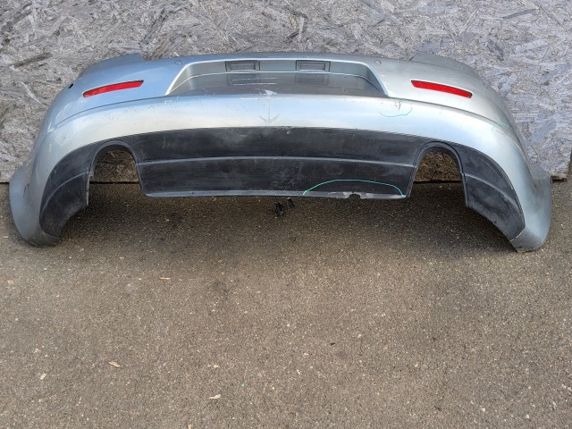 198197 Lökhárító Használt  hátsó Ezüst   a képen látható sérüléssel