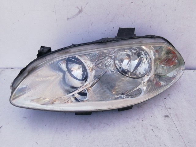 198394 Fiat Croma  2005-2008 Lámpa , Fényszóró Használt  sima bal első  a képen látható sérüléssel