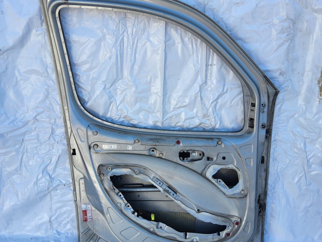 198640 Fiat Doblo 2000-2009 bal első ajtó, a képen látható sérüléssel