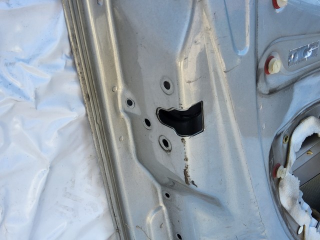 198640 Fiat Doblo 2000-2009 bal első ajtó, a képen látható sérüléssel