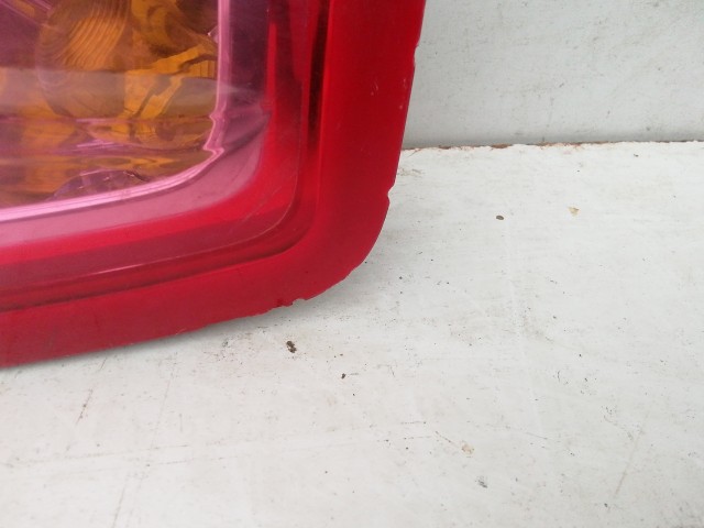 198532 Fiat Grande Punto jobb hátsó lámpa izzófoglalat nélkül, a képen látható sérüléssel