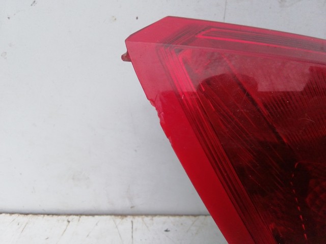 198530 Fiat Grande Punto jobb hátsó lámpa izzófoglalat nélkül, a képen látható sérüléssel