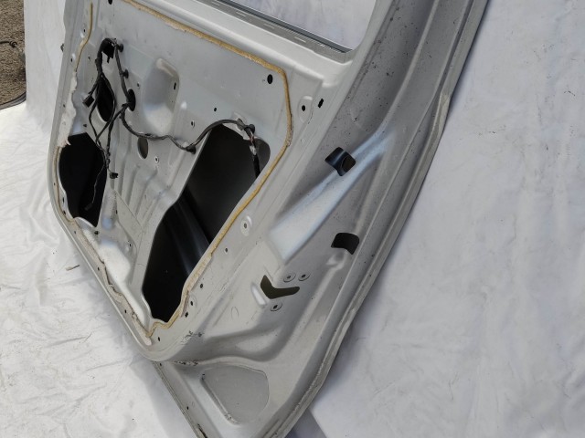 154672 Fiat Doblo 2009-2022 jobb első ezüst színű ajtó,a képen látható sérüléssel