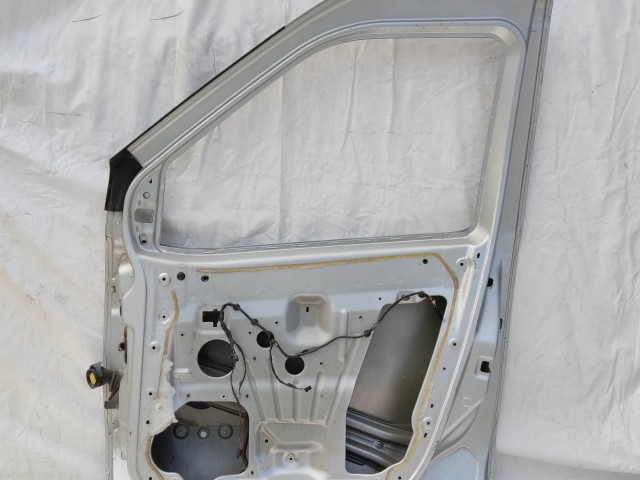154672 Fiat Doblo 2009-2022 jobb első ezüst színű ajtó,a képen látható sérüléssel