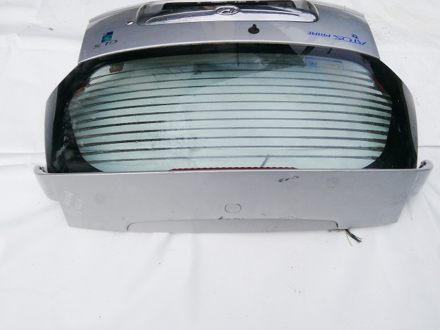 201801 Hyundai Atos 1999-2003 Csomagtérajtó, a képen látható sérüléssel