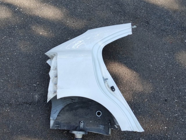 204598 Kia Rio 2011-2017 jobb hátsó sárvédő használt a képen látható sérüléssel