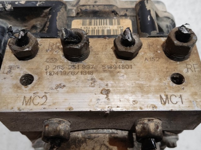 206837 Fiat Grande Punto abs egység 51894801 , 0265251997 a képen látható sérüléssel