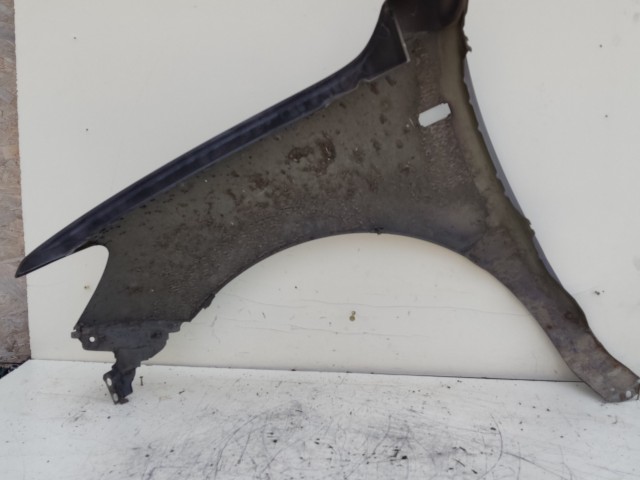 207034 Hyundai Santa FÉ II. 2007-2012 jobb első sárvédő, a képen látható sérüléssel