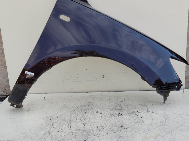 207034 Hyundai Santa FÉ II. 2007-2012 jobb első sárvédő, a képen látható sérüléssel