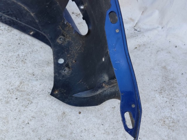 208700 Fiat Grande Punto  2005-2009 kék színű első lökhárító, a képen látható sérüléssel