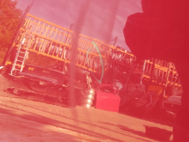 208705 Opel Agila , Suzuki Splash 2008-2014 bal első piros színű ajtó, a képen látható sérüléssel