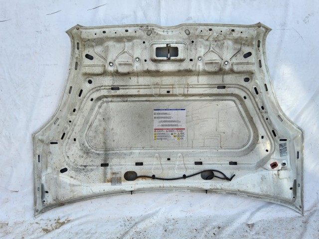 207526 Fiat Doblo 2009-2015 motorháztető, a képen látható sérüléssel