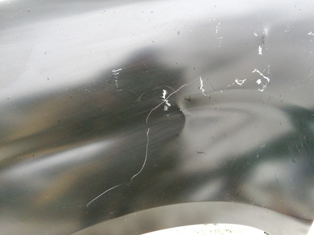 211697 Opel Combo D 2012-2018 Fiat Doblo 2009-2015 bal első sárvédő, a képen látható sérüléssel