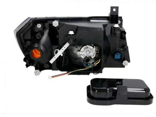 Ford Transit 2000-2006 utángyártott új bal első fényszóró H4 belülr. áll. (króm belső házzal) TYC