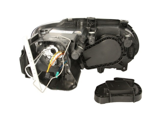 Volkswagen Caddy III. 2004.02.01-2009.12.31, Touran 2003.04.01-2006.11.30 utángyártott új bal első fényszóró H7/H1króm h.(motoros) VISTEON-tip. TYC