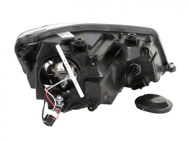 Volkswagen Caddy III.  2010.01.01-2013.04.30 utángyártott új bal első fényszóró H4 + napp.fény.  (motorral) TYC