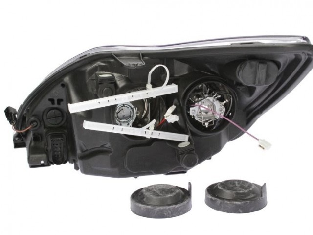 Ford Focus II. 2007.09.01-2011.02.28  utángyártott új jobb első fényszóró H1/H7 fek. h., kany.köv. (motorral)TYC