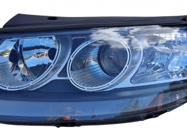 Hyundai Santa FÉ II. 2006.02.01-2009.09.30 utángyártott új bal első fényszóró 2H7 (motorral) TYC