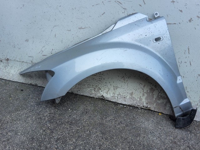 218003 Dodge Caliber 2006-2011 bal első sárvédő
