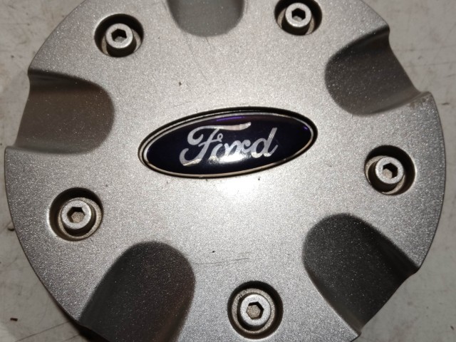 218709 Ford Focus 1998-2004 felni közép kupak, a képen látható sérüléssel 98AB-1130-CB