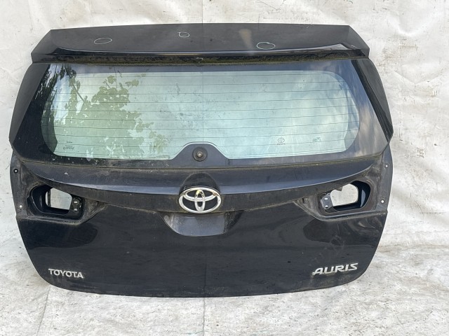 219064 Toyota Auris 5 ajtós E18 2012-2019 csomagtérajtó, a képen látható sérüléssel