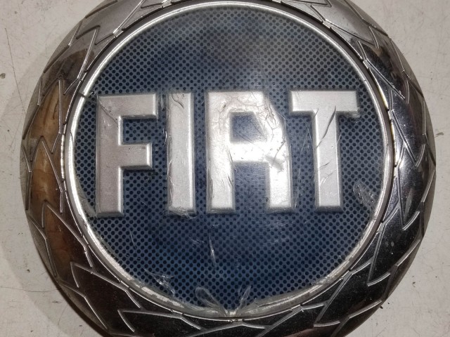 222062 Fiat Grande Punto, Stilo, Croma, Multipla, Doblo II. kék színű első embléma 98 mm átmérő, a képen látható állapotban