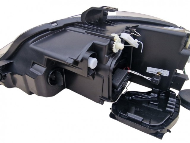 Seat Altea 5P 2009-2015, Leon 2009-2012, Toledo 5P 2004-2009 utángyártott új jobb első fényszóró H7/H1 fekete házas (motorral) TYC