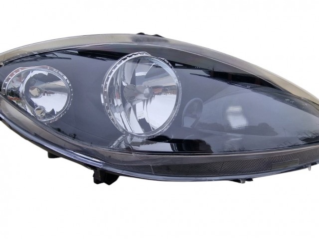 Seat Altea 5P 2009-2015, Leon 2009-2012, Toledo 5P 2004-2009 utángyártott új jobb első fényszóró H7/H1 fekete házas (motorral) TYC
