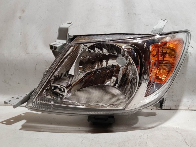 223431 Toyota Hilux 2005.07.01-2015.12.01 gyári új bal első fényszóró H4 (motorral)