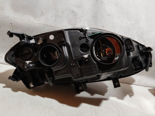 221593 Fiat Bravo 2007-2014 bal első fényszóró, a képen látható sérüléssel, izzó takaró kupak nélkül